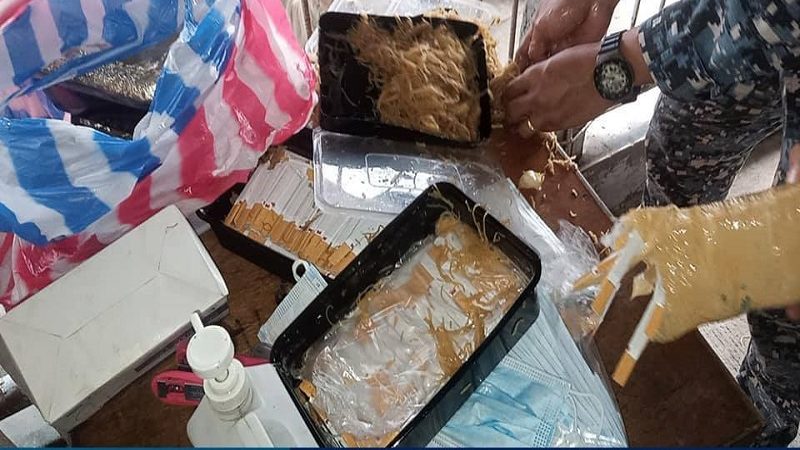 Mahigit 3,000 stick ng yosi tinangkang ipuslit sa selda sa Caloocan; isiniksik sa lechon manok at pansit